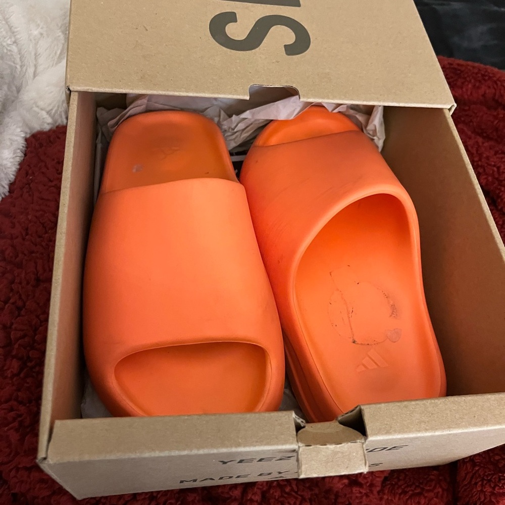 Orange adidas’s yeezy men/unisex slides